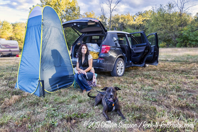 Sharon and her dog camping in her car at Sleepy Creek HarFest.Mama Corn